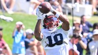 New England Patriots wide receiver Kyle Williams (18) makes a catch during training camp at Gillette Stadium.