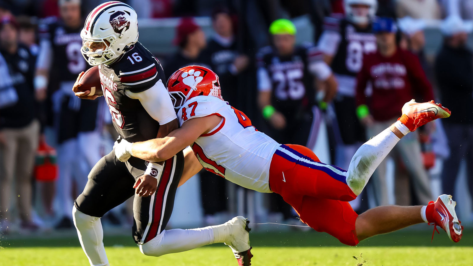 South Carolina Gamecocks quarterback Lanorris Sellers (16) is brought down by Clemson Tigers linebacker Sammy Brown (47) in the second quarter at Williams-Brice Stadium.