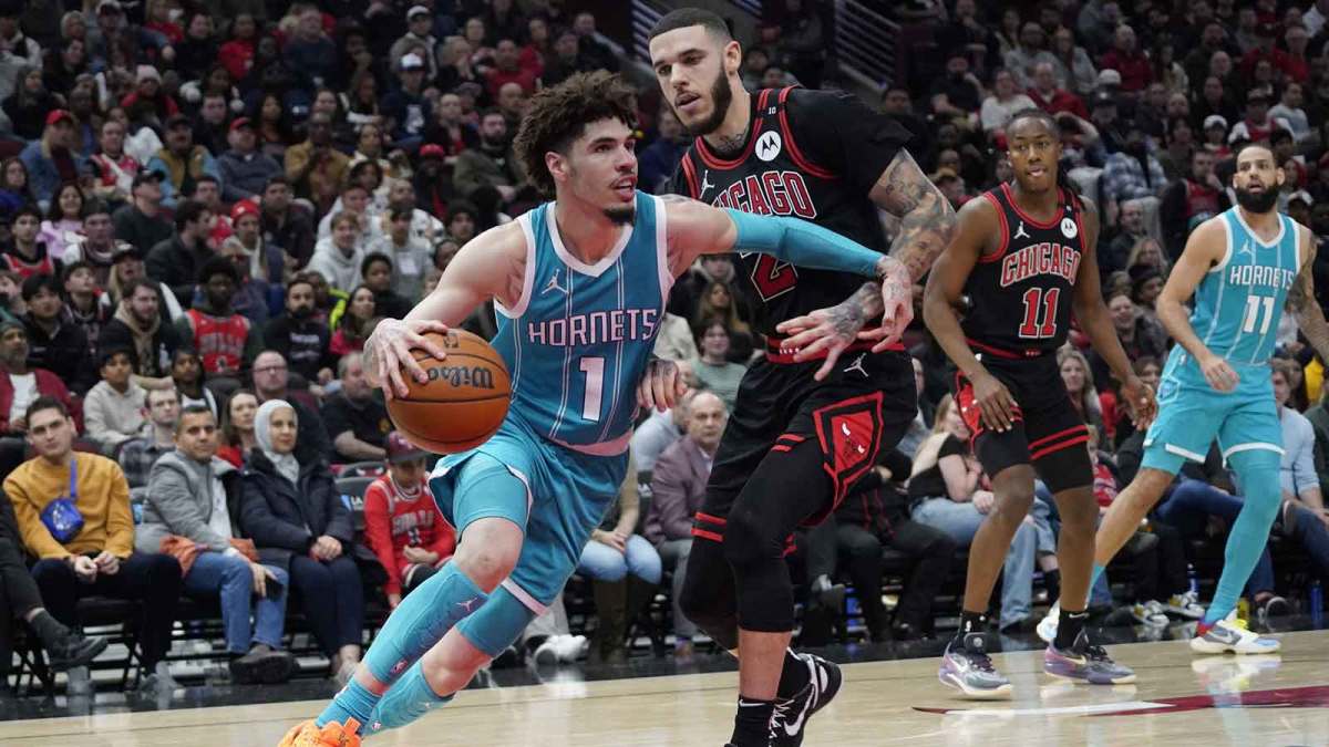 Chicago Bulls guard Lonzo Ball (2) defends Charlotte Hornets guard LaMelo Ball (1) during the second half at United Center. Mandatory Credit: David Banks-Imagn Images