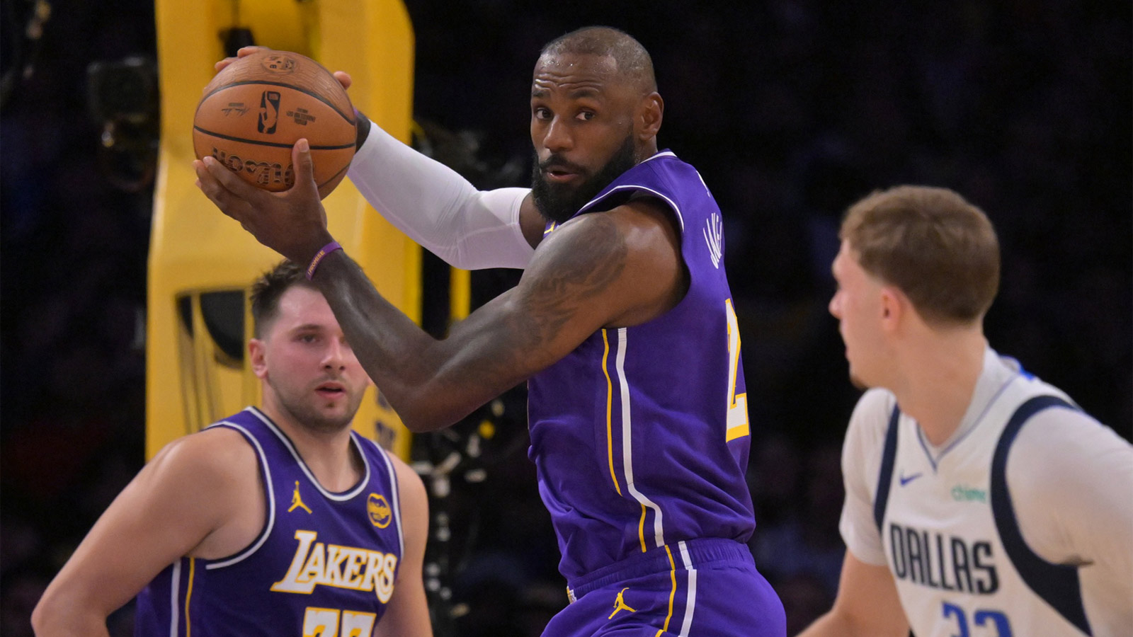 Lakers forward LeBron James (23) rebounds in the first half against the Dallas Mavericks at Crypto.com Arena