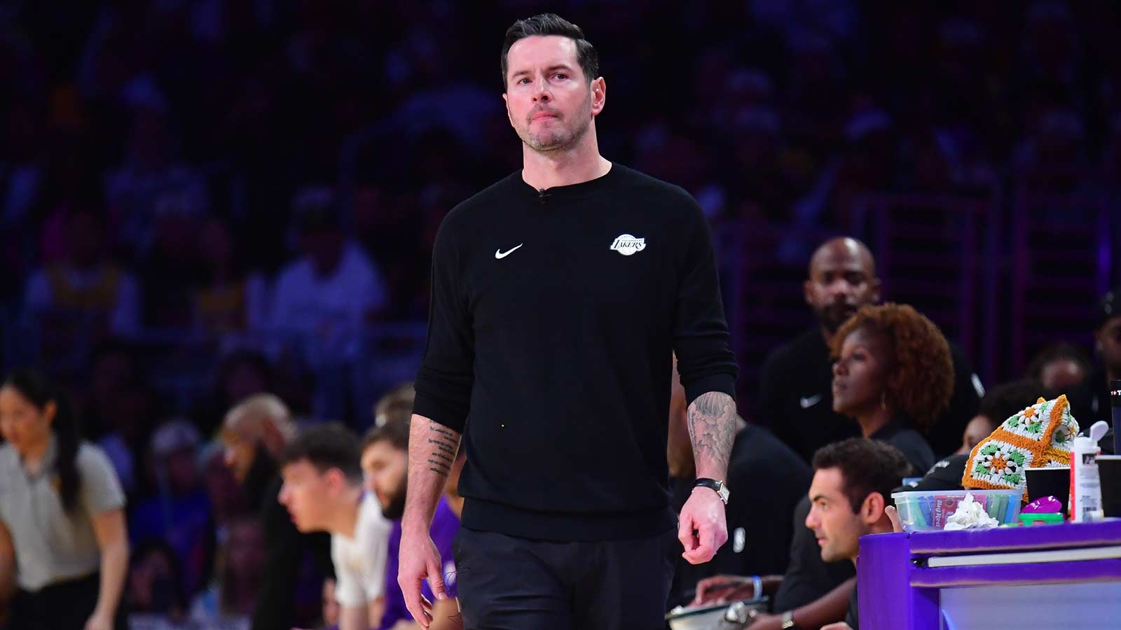 Los Angeles Lakers head coach JJ Redick watches game action against the Houston Rockets during the first half at Crypto.com Arena.
