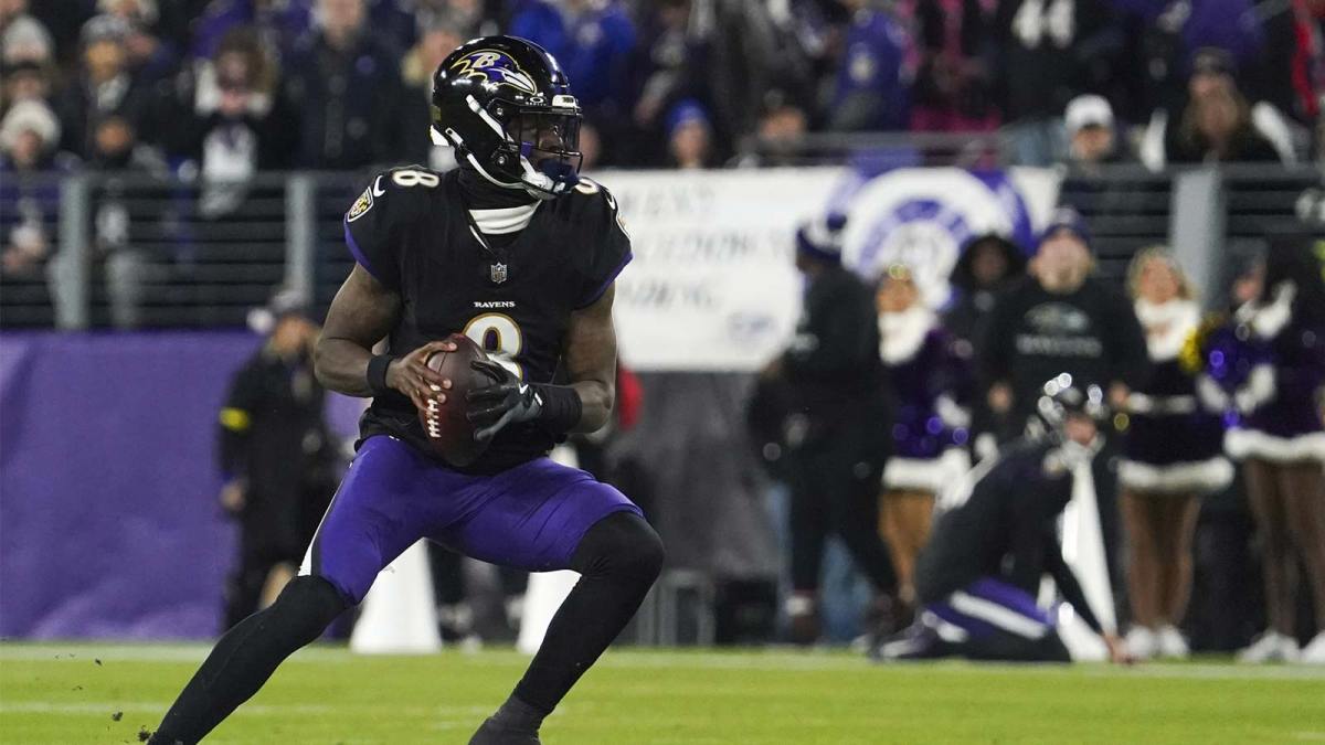 Baltimore Ravens quarterback Lamar Jackson (8) looks to pass against the New England Patriots during the first quarter of the game at M&T Bank Stadium.