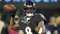 Baltimore Ravens quarterback Lamar Jackson (8) warms up prior to the game against the New England Patriots at M&T Bank Stadium.
