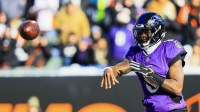 Baltimore Ravens quarterback Lamar Jackson (8) throws a pass against the Cincinnati Bengals in the first half at Paycor Stadium.