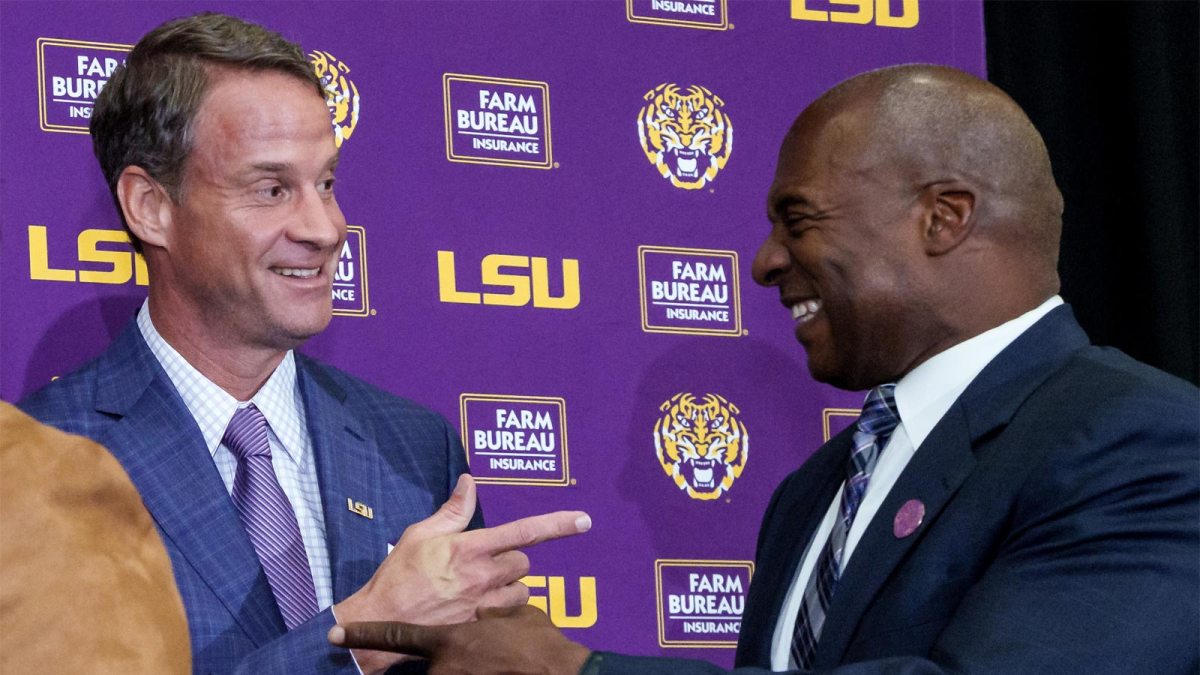 LSU Tigers head football coach Lane Kiffin and the school's athletic director Verge Ausberry.