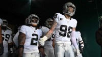 Las Vegas Raiders running back Ashton Jeanty (2) and defensive end Maxx Crosby (98) in the tunnel against the Philadelphia Eagles at Lincoln Financial Field.