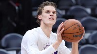 Utah Jazz forward Lauri Markkanen (23) warms up before the game against the Dallas Mavericks at Delta Center.