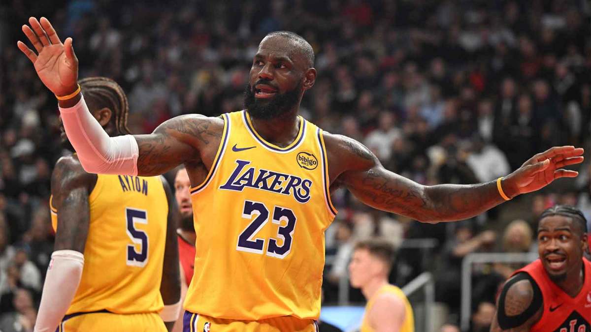 Los Angeles Lakers forward LeBron James (23) reacts after losing the ball against the Toronto Raptors in the first half at Scotiabank Arena.
