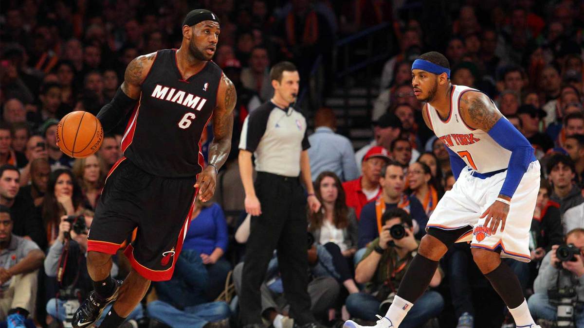 Miami Heat small forward LeBron James (6) controls the ball against New York Knicks small forward Carmelo Anthony (7) during the third quarter of a game at Madison Square Garden. The Heat defeated the Knicks 106-91.