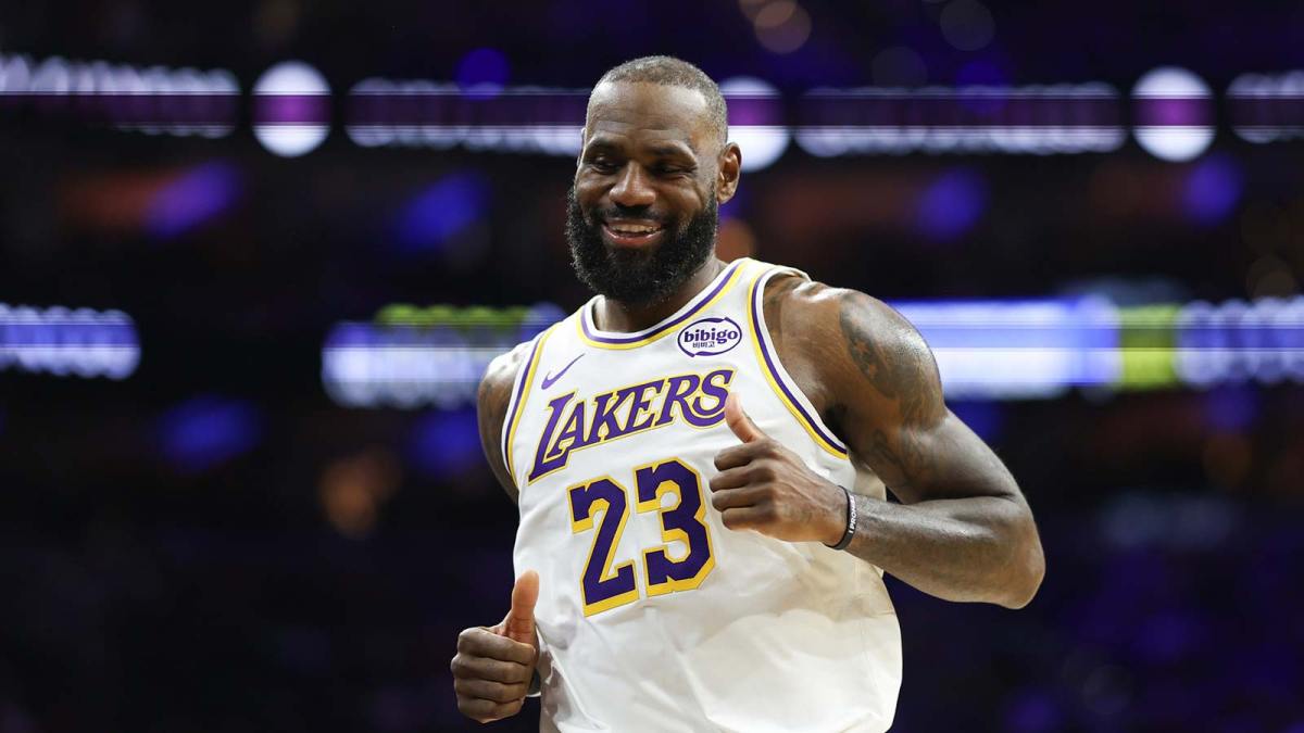Los Angeles Lakers forward Lebron James (23) reacts after a play against the Philadelphia 76ers during the second quarter at Xfinity Mobile Arena. Mandatory Credit: Bill Streicher-Imagn Images