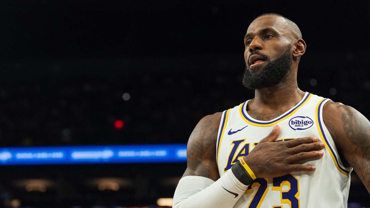 Los Angeles Lakers forward LeBron James (23) looks on during the second half of a game against the Phoenix Suns at Mortgage Matchup Center.