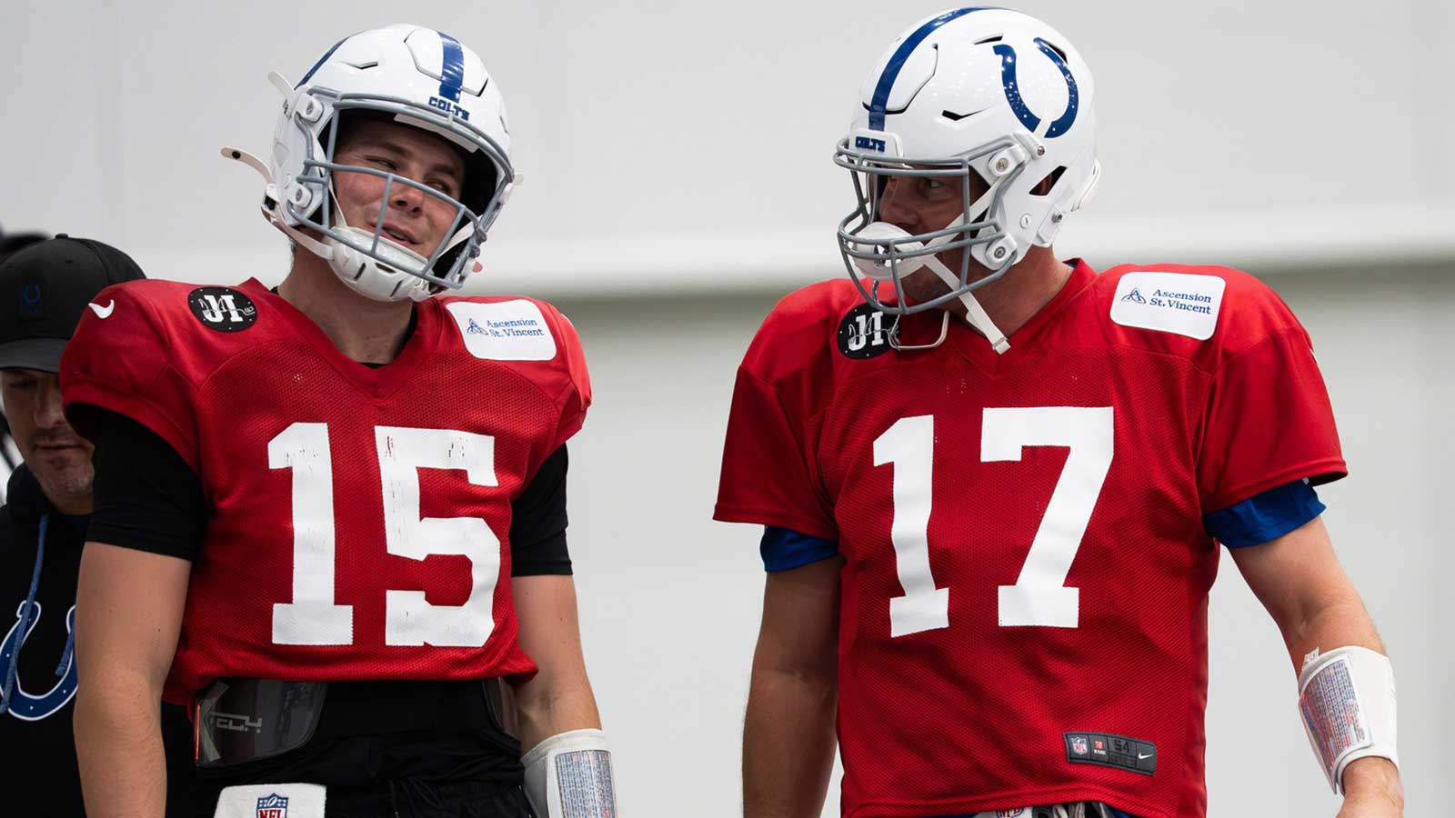 Indianapolis Colts quarterbacks Philip Rivers (17) and Riley Leonard (15) talk Wednesday, Dec. 10, 2025, during practice at the Colts training facility in Indianapolis.