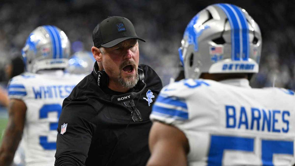 Detroit Lions head coach Dan Campbell celebrates after a play during the first half against the Dallas Cowboys at Ford Field.