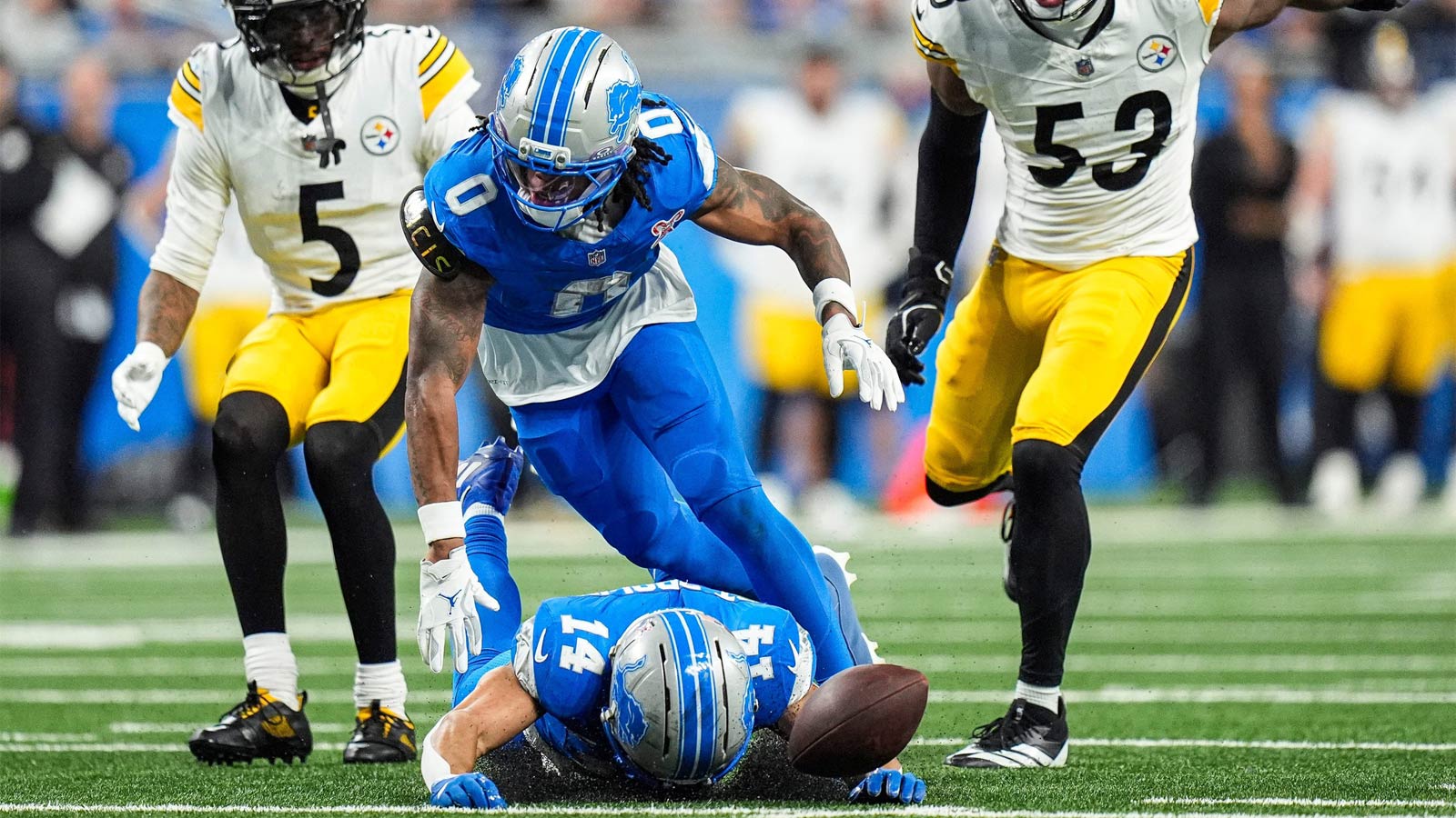 Detroit Lions wide receiver Amon-Ra St. Brown drops a pass intended for him against the Pittsburgh Steelers, as running back Jahmyr Gibbs (0) looks on during the second half at Ford Field in Detroit on Sunday, Dec. 21, 2025.