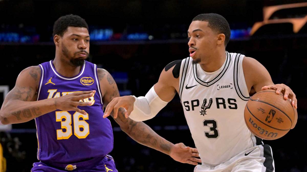 Los Angeles Lakers guard Marcus Smart (36) defends San Antonio Spurs forward Keldon Johnson (3) during the first half at Crypto.com Arena.