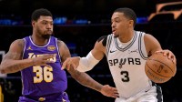 Los Angeles Lakers guard Marcus Smart (36) defends San Antonio Spurs forward Keldon Johnson (3) during the first half at Crypto.com Arena.