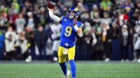 Los Angeles Rams quarterback Matthew Stafford (9) warms up before the game against the Seattle Seahawks at Lumen Field.