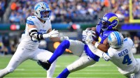 Los Angeles Rams wide receiver Davante Adams (17) catches a pass against Detroit Lions linebacker Trevor Nowaske (53) and Detroit Lions cornerback D.J. Reed (4) during the first quarter at SoFi Stadium.