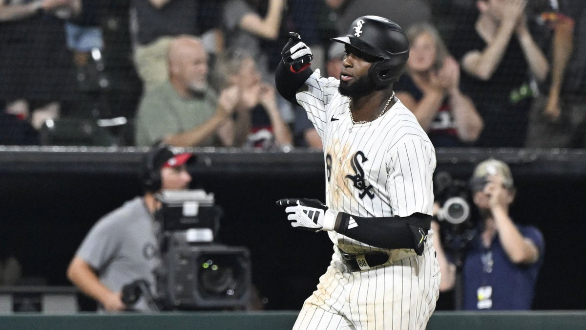 Chicago White Sox outfielder Luis Robert Jr. (88) gestures after he hits a home run during the eighth inning against the Minnesota Twins at Rate Field.
