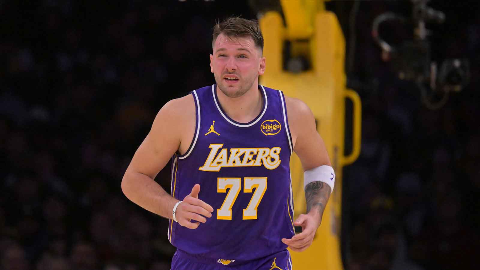 Los Angeles Lakers guard Luka Doncic (77) reacts after he was poked in the eye during the first half against the San Antonio Spurs at Crypto.com Arena. 
