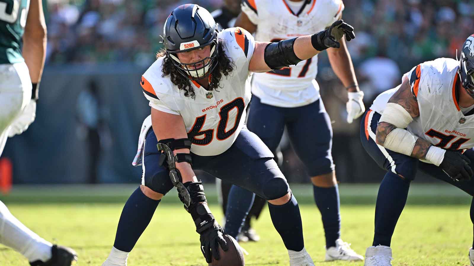 Broncos lose starting center to IR right before playoff push