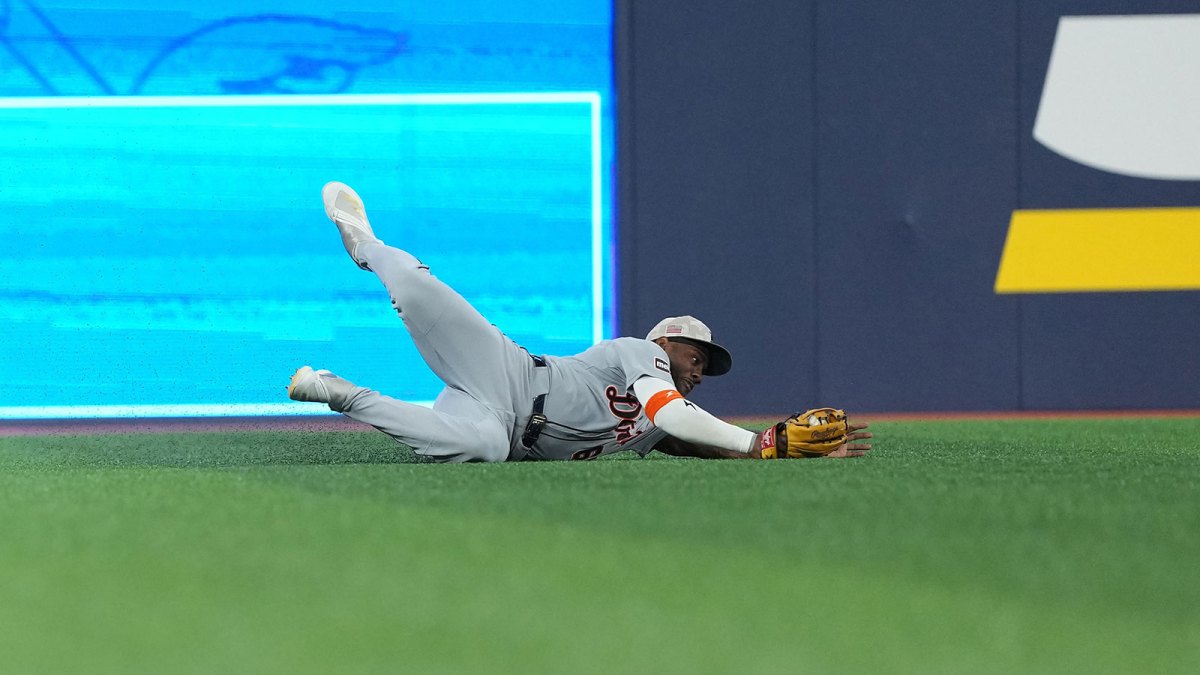 Detroit Tiger left fielder Akil Baddoo (60) catches a fly ball for an out against the Toronto Blue Jays during the first inning at Rogers Centre.