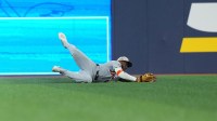 Detroit Tiger left fielder Akil Baddoo (60) catches a fly ball for an out against the Toronto Blue Jays during the first inning at Rogers Centre.