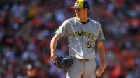 Milwaukee Brewers pitcher Hoby Milner (55) prepares to pitch during the eighth inning against the Baltimore Orioles at Oriole Park at Camden Yards.