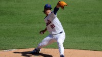 New York Mets starting pitcher Jonah Tong (21) pitches against the San Diego Padres during the second inning at Citi Field. Mandatory Credit: Brad Penner-Imagn Images