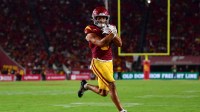 Southern California Trojans wide receiver Makai Lemon (6) runs for a touchdown against the Michigan State Spartans during the second half at the Los Angeles Memorial Coliseum.
