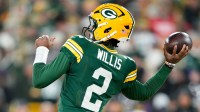 Green Bay Packers quarterback Malik Willis (2) throws a pass during the first quarter against the Baltimore Ravens at Lambeau Field.