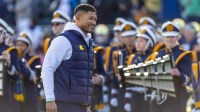 Notre Dame Fighting Irish head coach Marcus Freeman smiles while participating in senior day activities before facing the Syracuse Orange at Notre Dame Stadium.