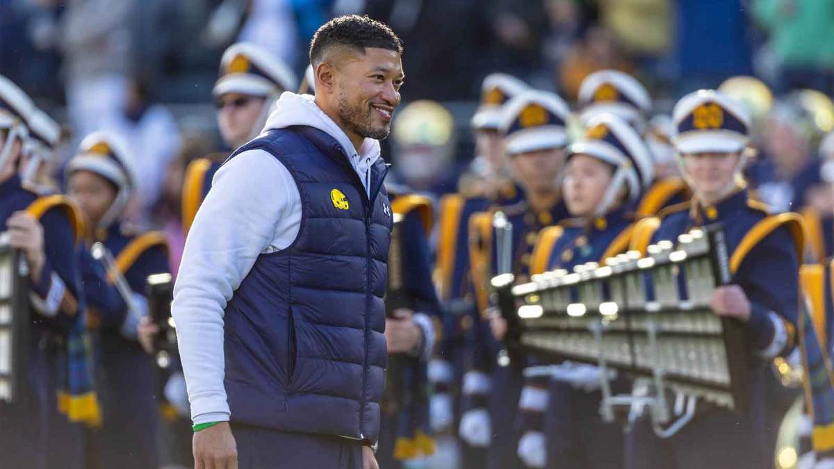 Notre Dame Fighting Irish head coach Marcus Freeman smiles while participating in senior day activities before facing the Syracuse Orange at Notre Dame Stadium.