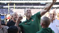 Miami Hurricanes head coach Mario Cristobal celebrates after defeating the Texas A&M Aggies in the first round game of the CFP National Playoff at Kyle Field. Mandatory Credit: Jerome Miron-Imagn Images