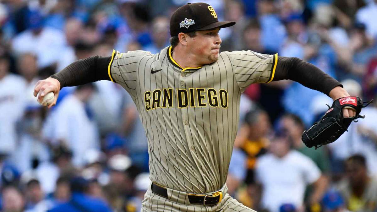 San Diego Padres pitcher Mason Miller (22) delivers during the seventh inning against the Chicago Cubs during game two of the Wildcard round for the 2025 MLB playoffs at Wrigley Field.