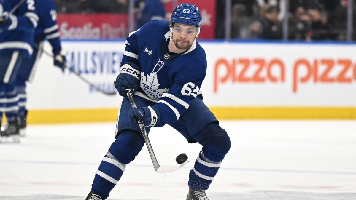 Toronto Maple Leafs forward Matias Maccelli (63) shoots the puck against the Boston Bruins in the third period at Scotiabank Arena.
