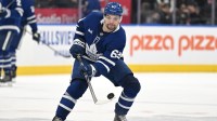 Toronto Maple Leafs forward Matias Maccelli (63) shoots the puck against the Boston Bruins in the third period at Scotiabank Arena.
