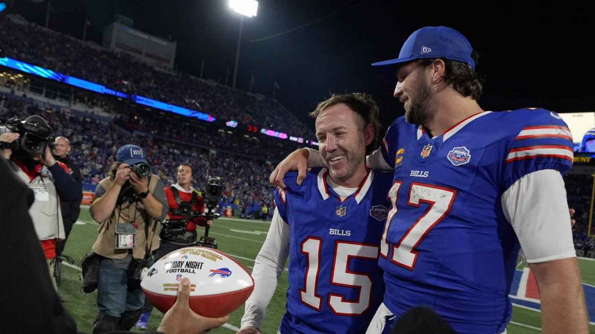 Buffalo Bills quarterback Josh Allen chats with Matt Prater who won the game with his field goal attempt. Prater received a Sunday Night football after the game at Highmark Stadium in Orchard Park on Sept. 7, 2025.