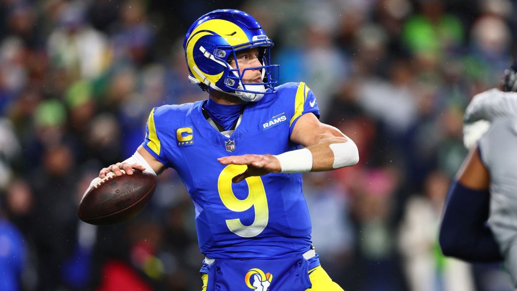 Los Angeles Rams quarterback Matthew Stafford (9) passes against the Seattle Seahawks in the first half at Lumen Field.