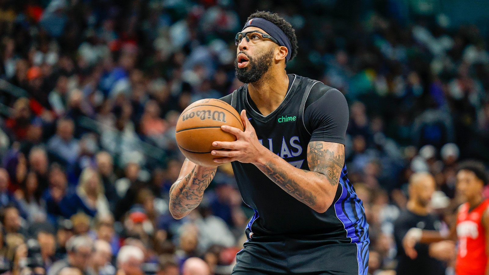 Dallas Mavericks forward Anthony Davis (3) takes a free throw late in the game against the Houston Rockets at American Airlines Center.