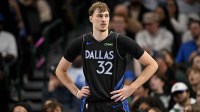 Dallas Mavericks forward Cooper Flagg (32) looks on during the second half against the Denver Nuggets at the American Airlines Center.