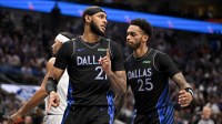 Dallas Mavericks forward P.J. Washington (25) and forward Daniel Gafford (21) celebrates a basket against the New York Knicks during the second quarter at the American Airlines Center.