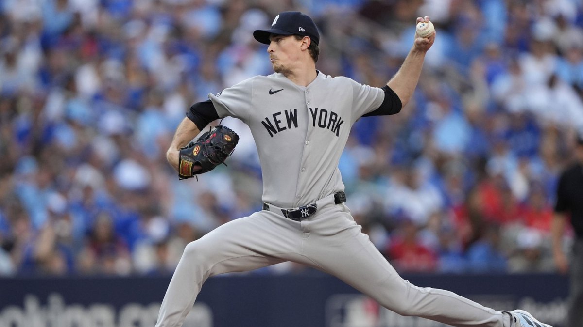 New York Yankees pitcher Max Fried (54) throws in the fourth inning against the Toronto Blue Jays during game two of the ALDS round for the 2025 MLB playoffs at Rogers Centre.