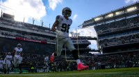 Las Vegas Raiders defensive end Maxx Crosby (98) runs onto the field before the game against the Philadelphia Eagles at Lincoln Financial Field.