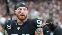Las Vegas Raiders defensive end Maxx Crosby (98) looks on from the sideline during the first quarter against the Chicago Bears at Allegiant Stadium.