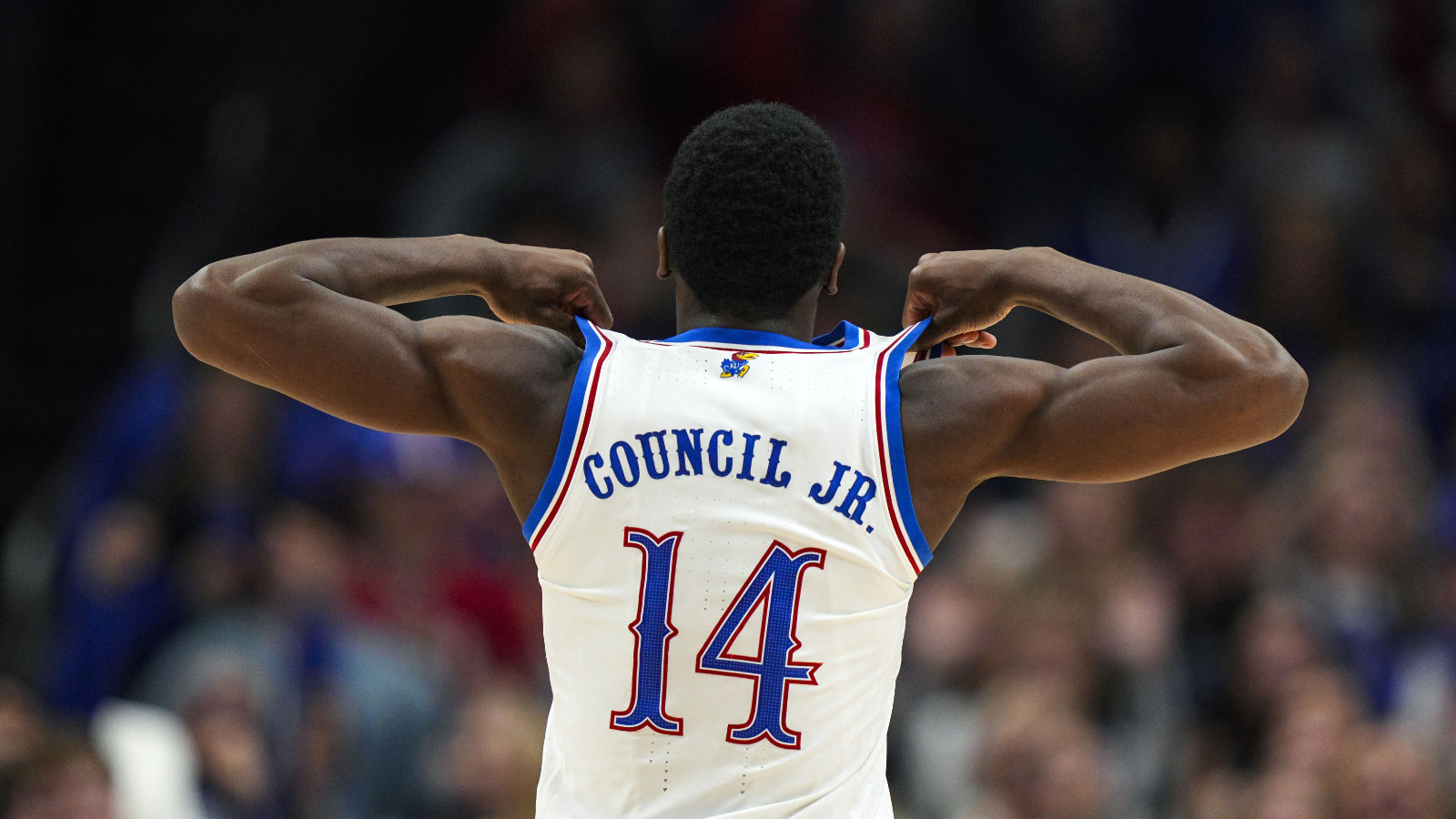 Kansas Jayhawks guard Melvin Council Jr. (14) celebrates after defeating the Missouri Tigers at T-Mobile Center.