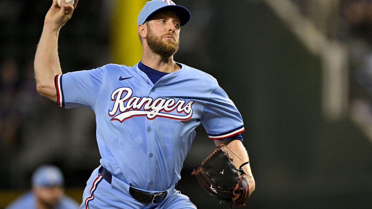 Texas Rangers starting pitcher Merrill Kelly (23) throws the ball during the first inning against the Miami Marlins at Globe Life Field.