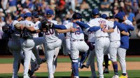 New York Mets players celebrate after defeating the San Diego Padres at Citi Field.