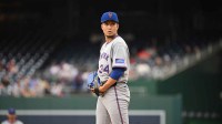New York Mets starting pitcher Kodai Senga (34) prepares to throw a pitch against the Washington Nationals during the first inning at Nationals Park.