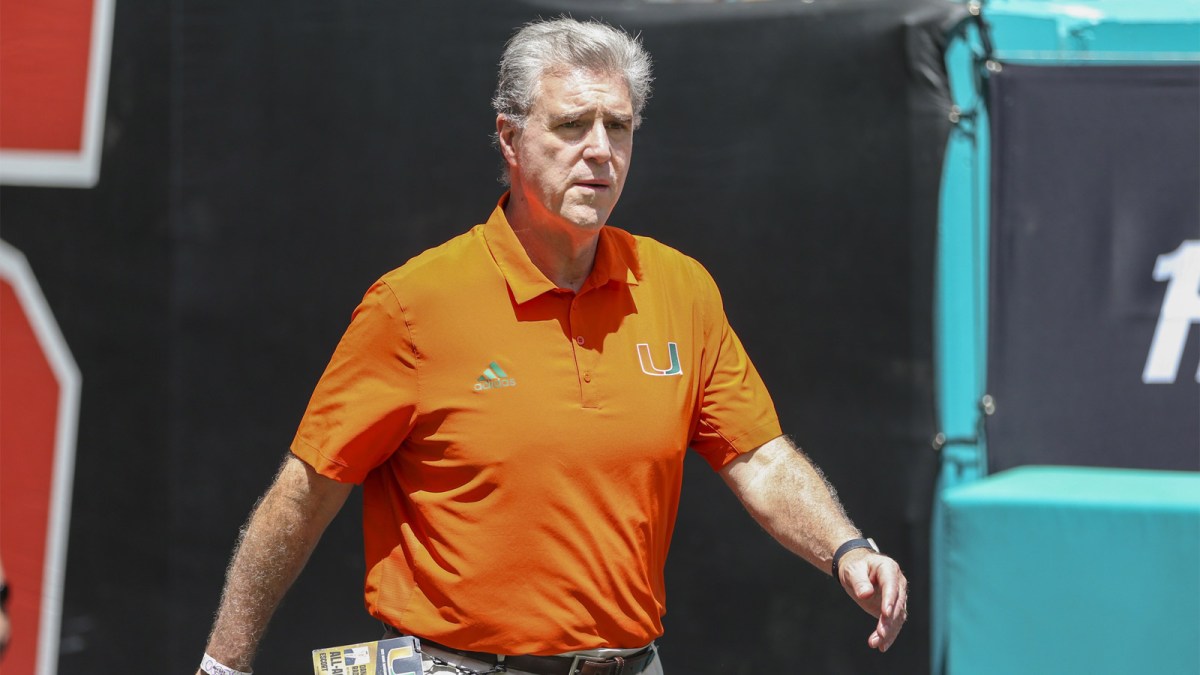 University of Miami Athletic Director Dan Radakovich walks on the field prior to the game against Bethune Cookman Wildcats at Hard Rock Stadium.